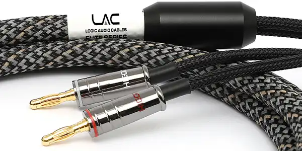 Close-up of LAC Elite Series braided audio cables with gold-plated RCA plugs (red and white accents).